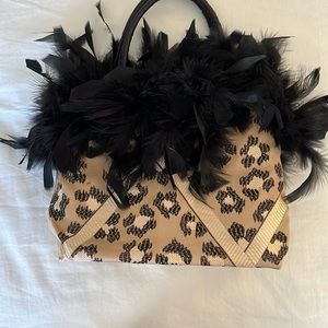 Boutique feather and satin fabric handbag